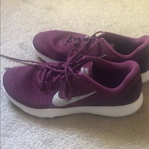 Purple Nike tennis shoes